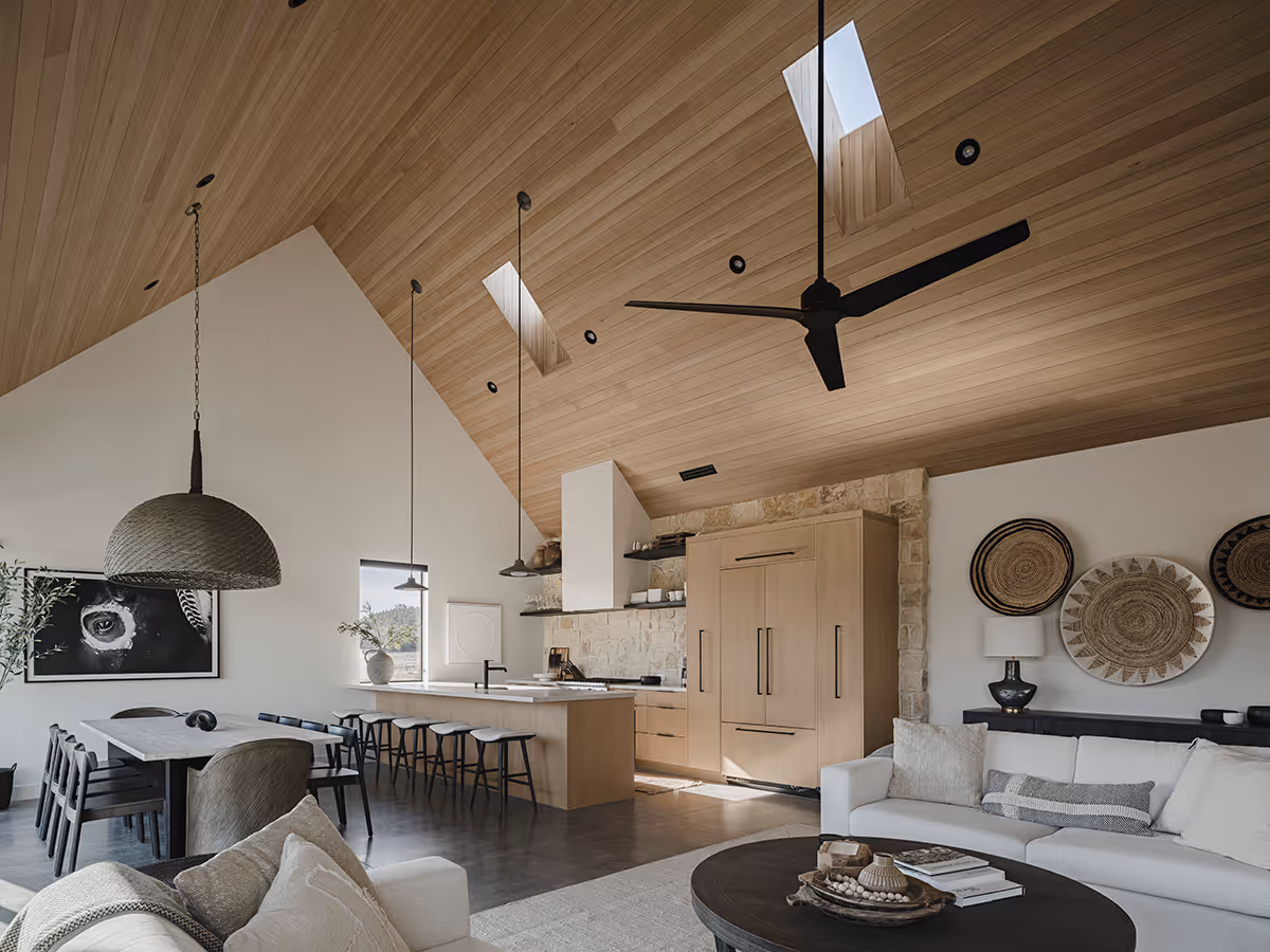 Great room with a vaulted wood ceiling at a modern Scandinavian house in Flagstaff, Arizona by The Ranch Mine