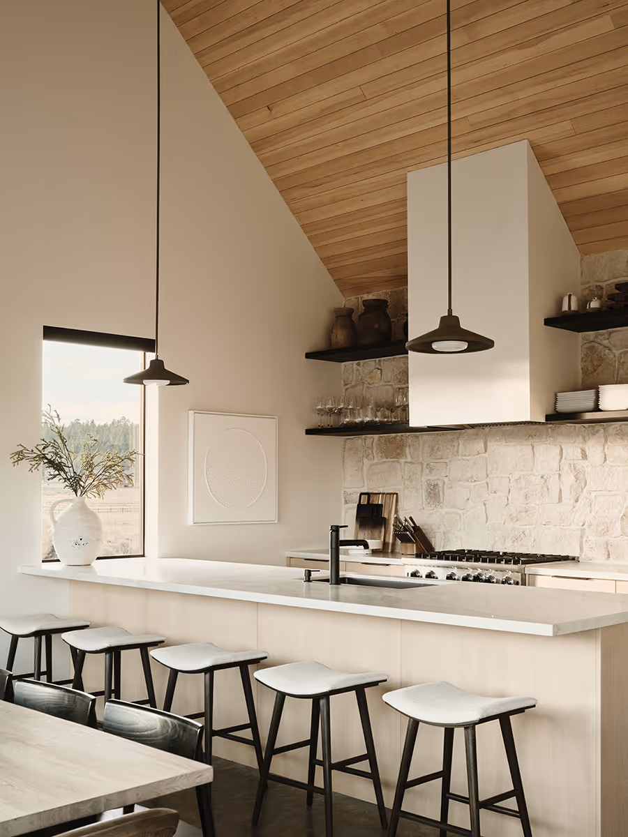 Light and bright kitchen with a wood ceiling at a modern Scandinavian house in Flagstaff, Arizona by The Ranch Mine