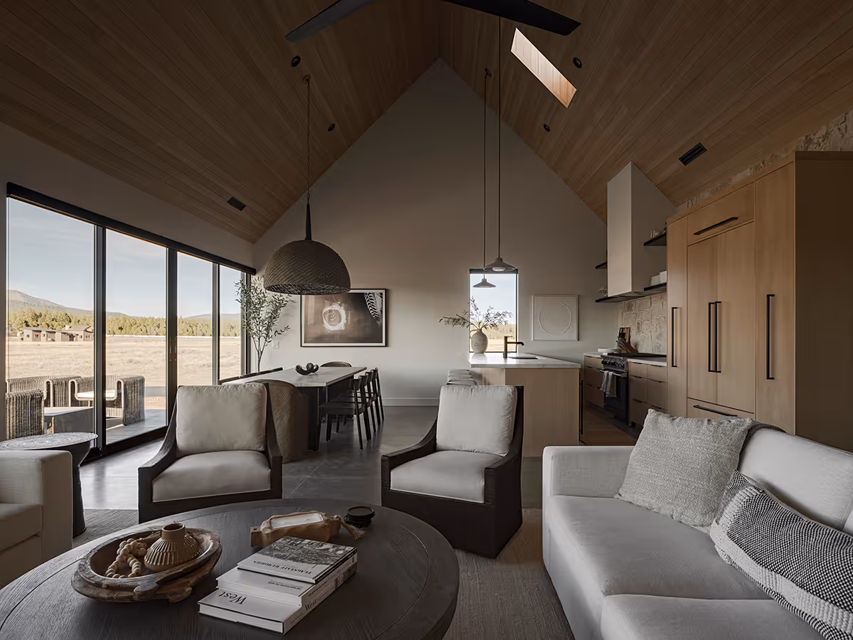 Great room with a vaulted wood ceiling at a modern Scandinavian house in Flagstaff, Arizona by The Ranch Mine