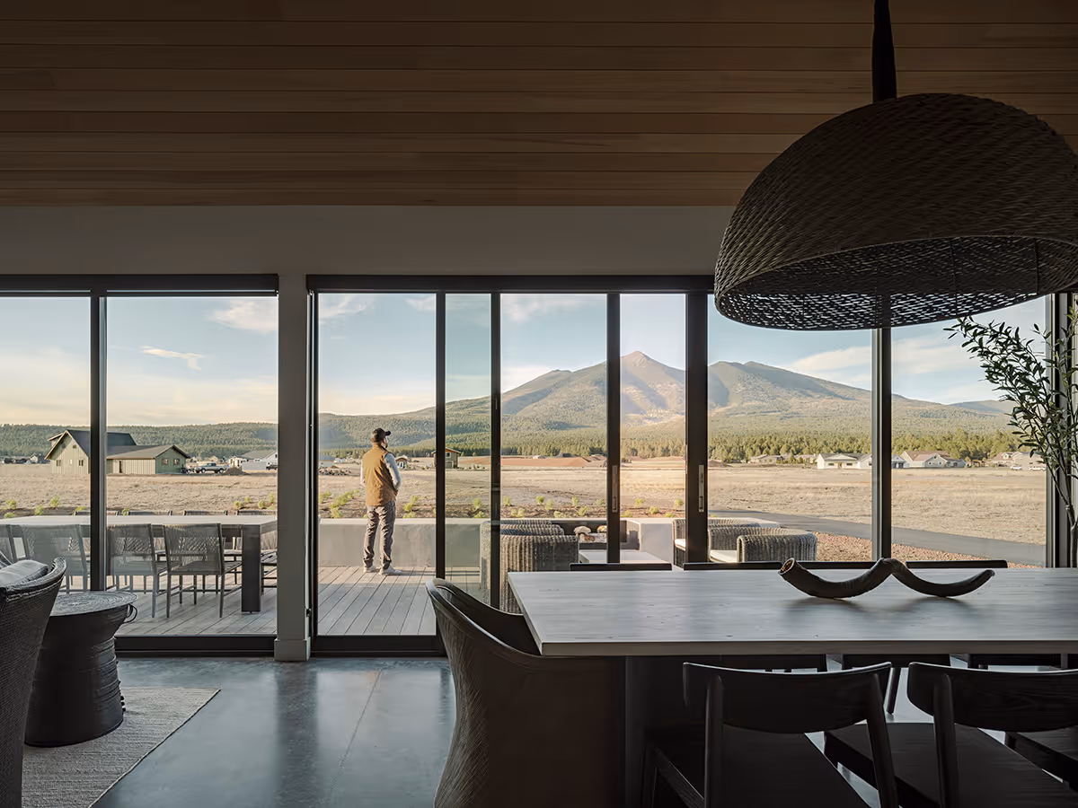 View to the mountains at a modern Scandinavian house in Flagstaff, Arizona by The Ranch Mine