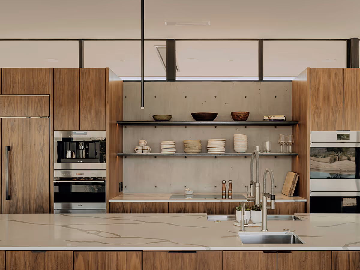 walnut and concrete kitchen at a desert modern house in Arizona by The Ranch Mine