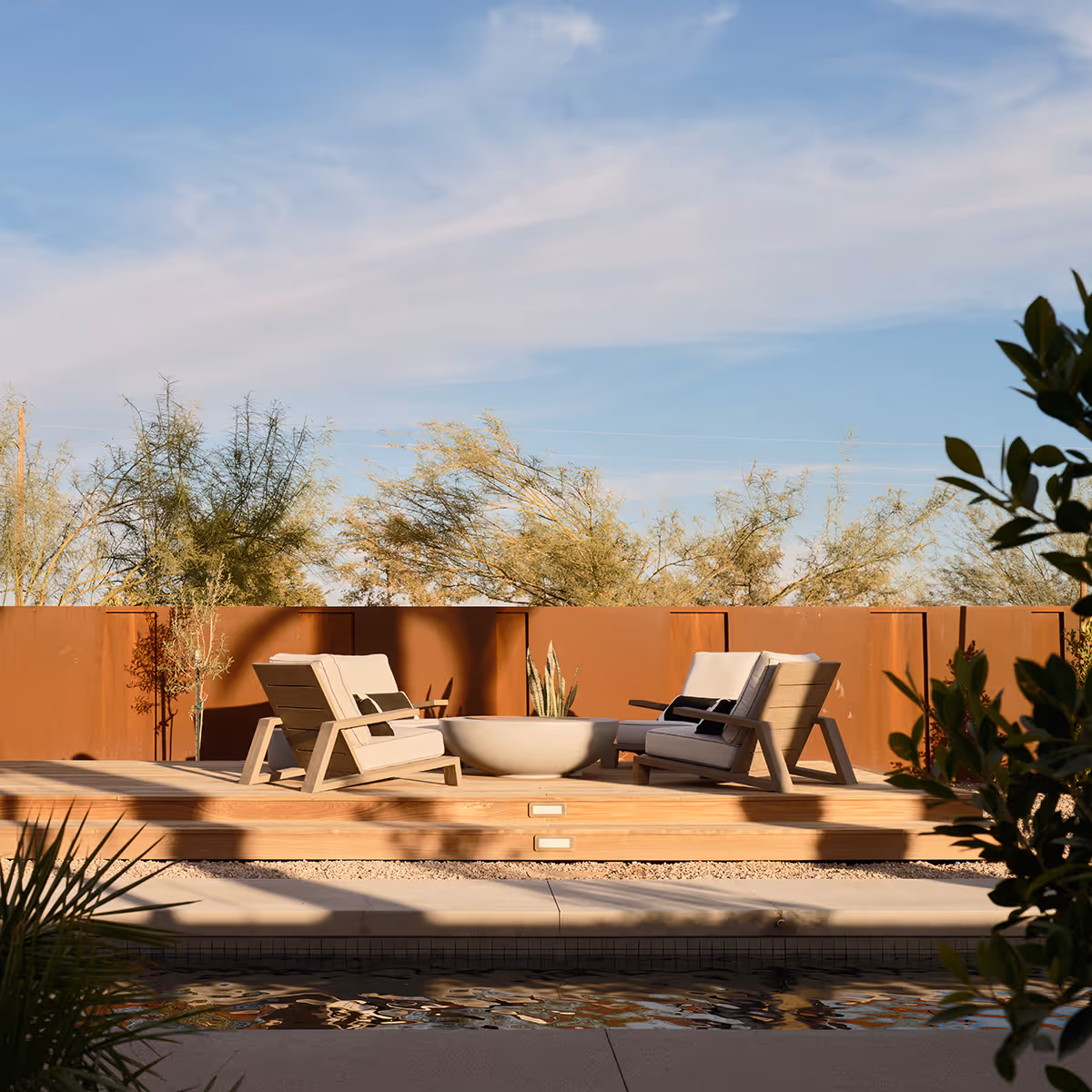 sun deck with fire pit at a desert modern house in Arizona by The Ranch Mine