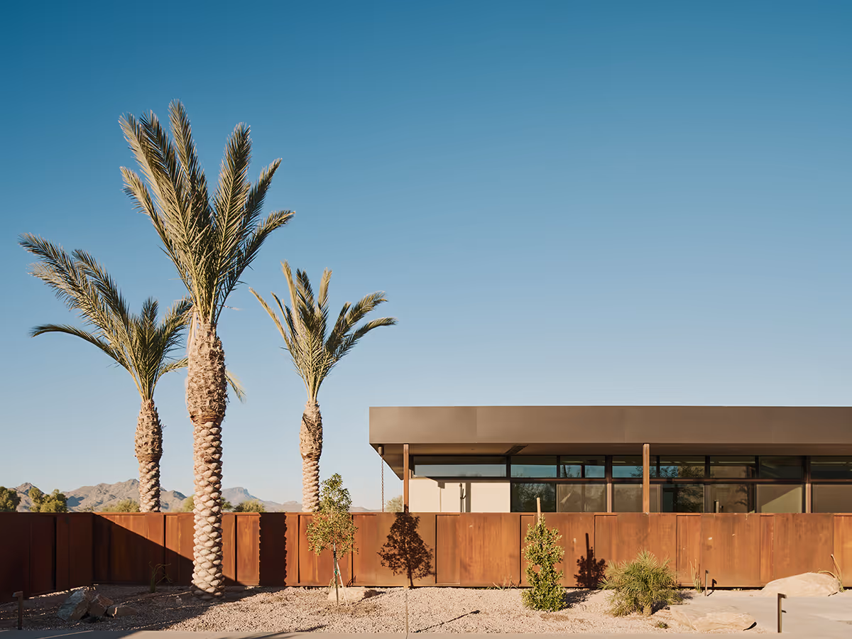 rusted steel pool fence at a desert modern house in Arizona by The Ranch Mine