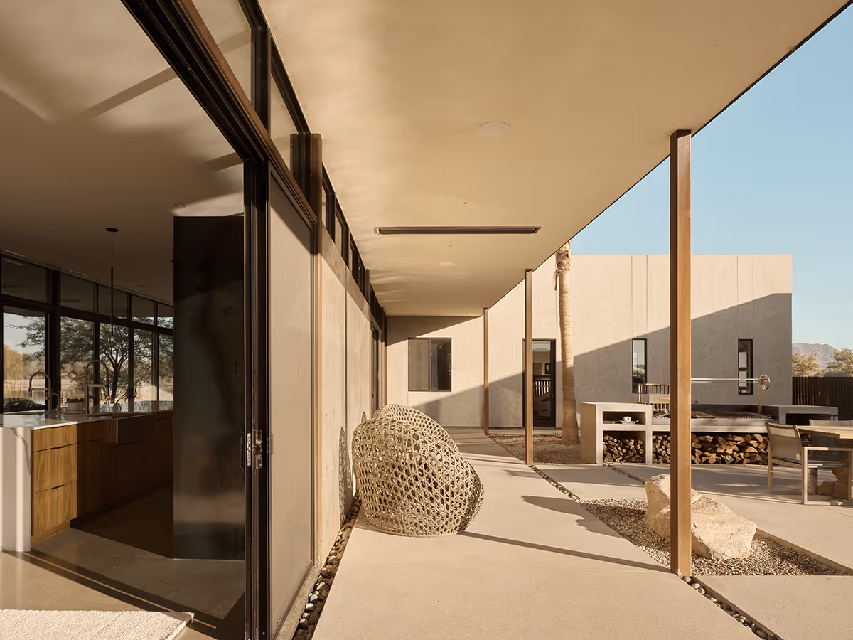 indoor outdoor covered patio at a desert modern house in Arizona by The Ranch Mine
