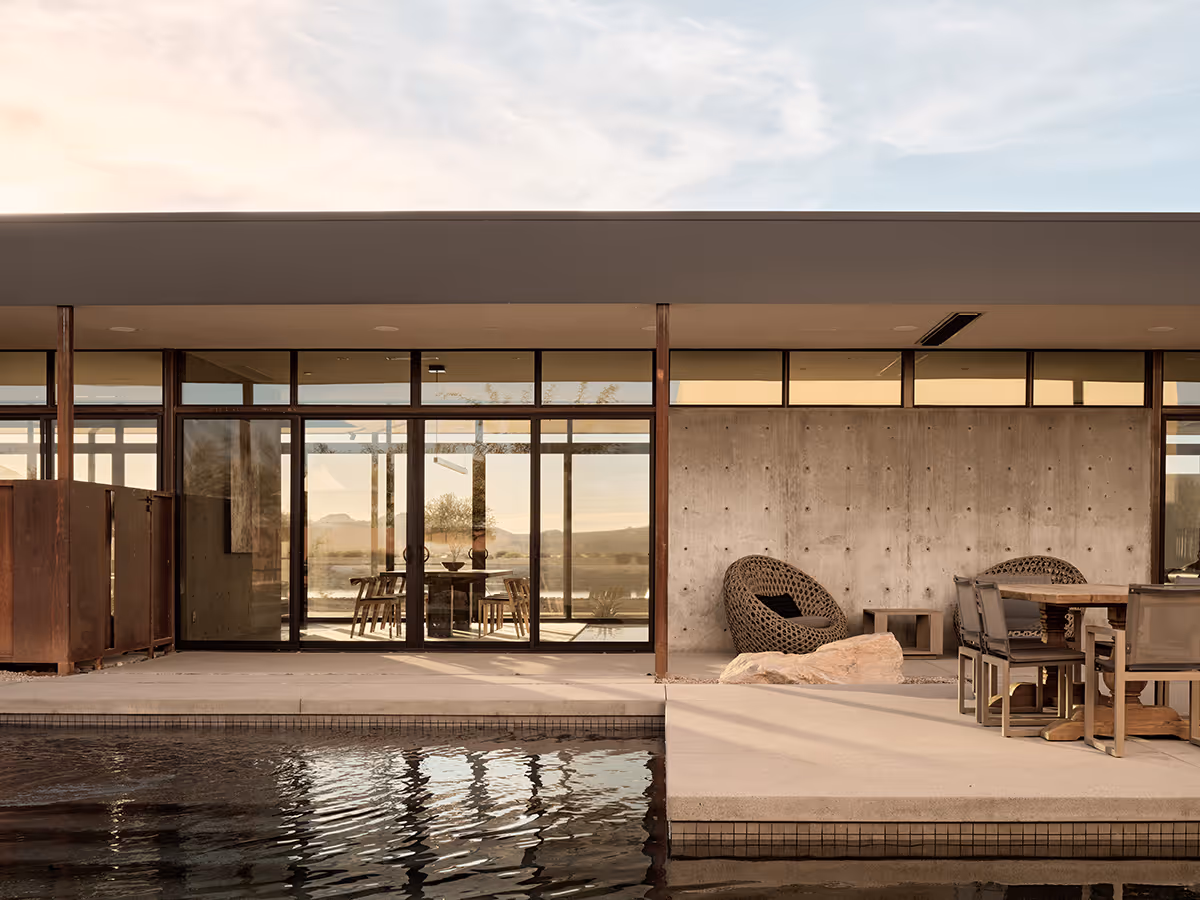 pool baja shelf and cast in place concrete wall at a desert modern house in Arizona by The Ranch Mine