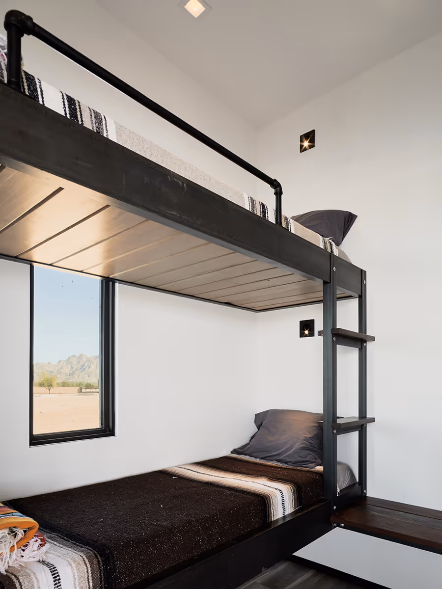 bunk beds in a modern boat house on a water ski lake in Arizona by The Ranch Mine