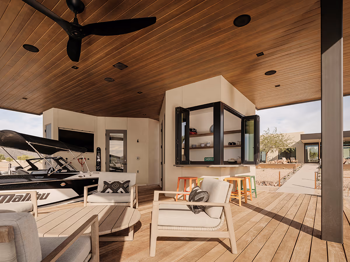 modern boat house with kitchen on a water ski lake in Arizona by The Ranch Mine
