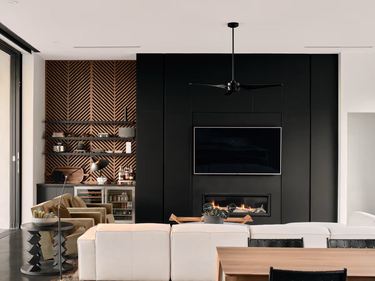 living room with wet bar by The Ranch Mine