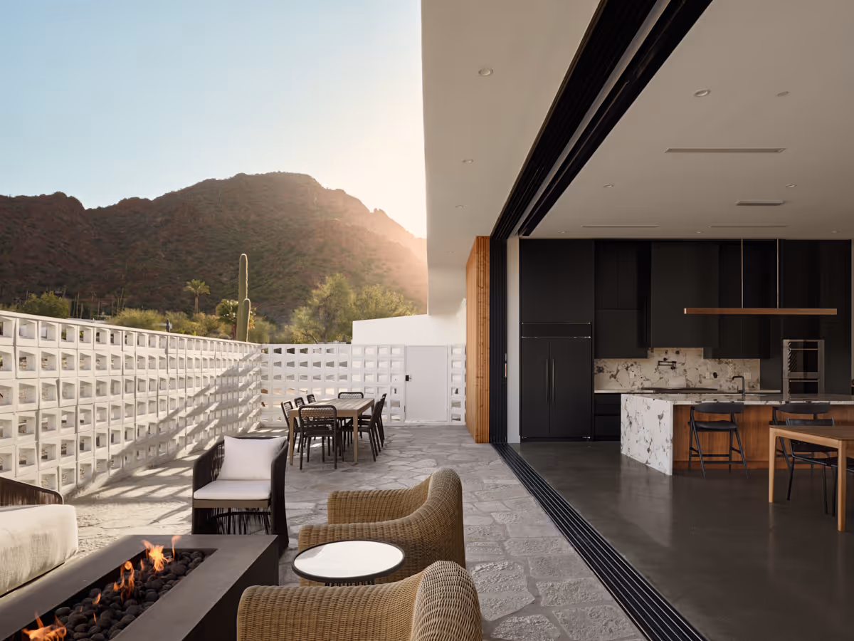 breeze block wall with camelback mountain beyond by The Ranch Mine