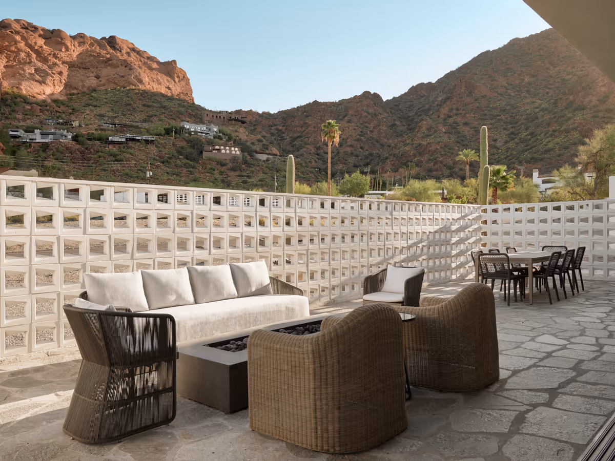 breeze block wall with camelback mountain beyond by The Ranch Mine