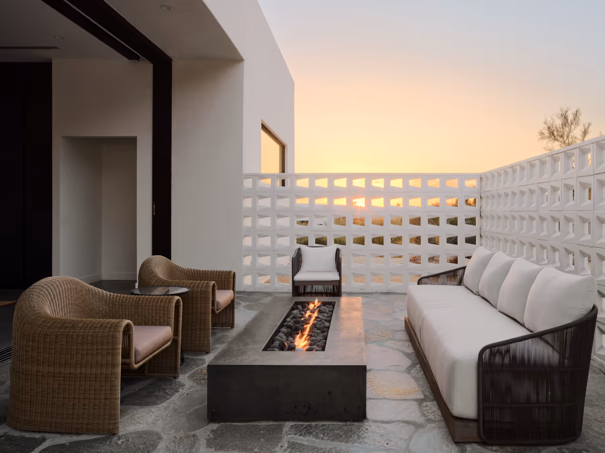 patio with breeze blocks and firepit by The Ranch Mine