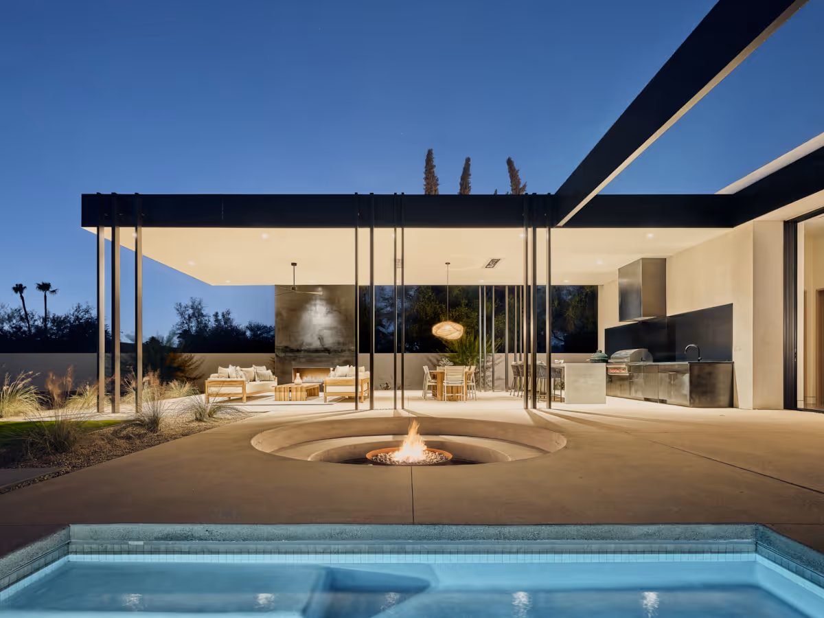 modern desert house pool, fire pit and outdoor patio