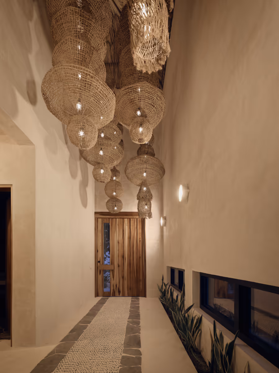 Custom banana fiber lighting at a tropical modern house in Belize by The Ranch Mine