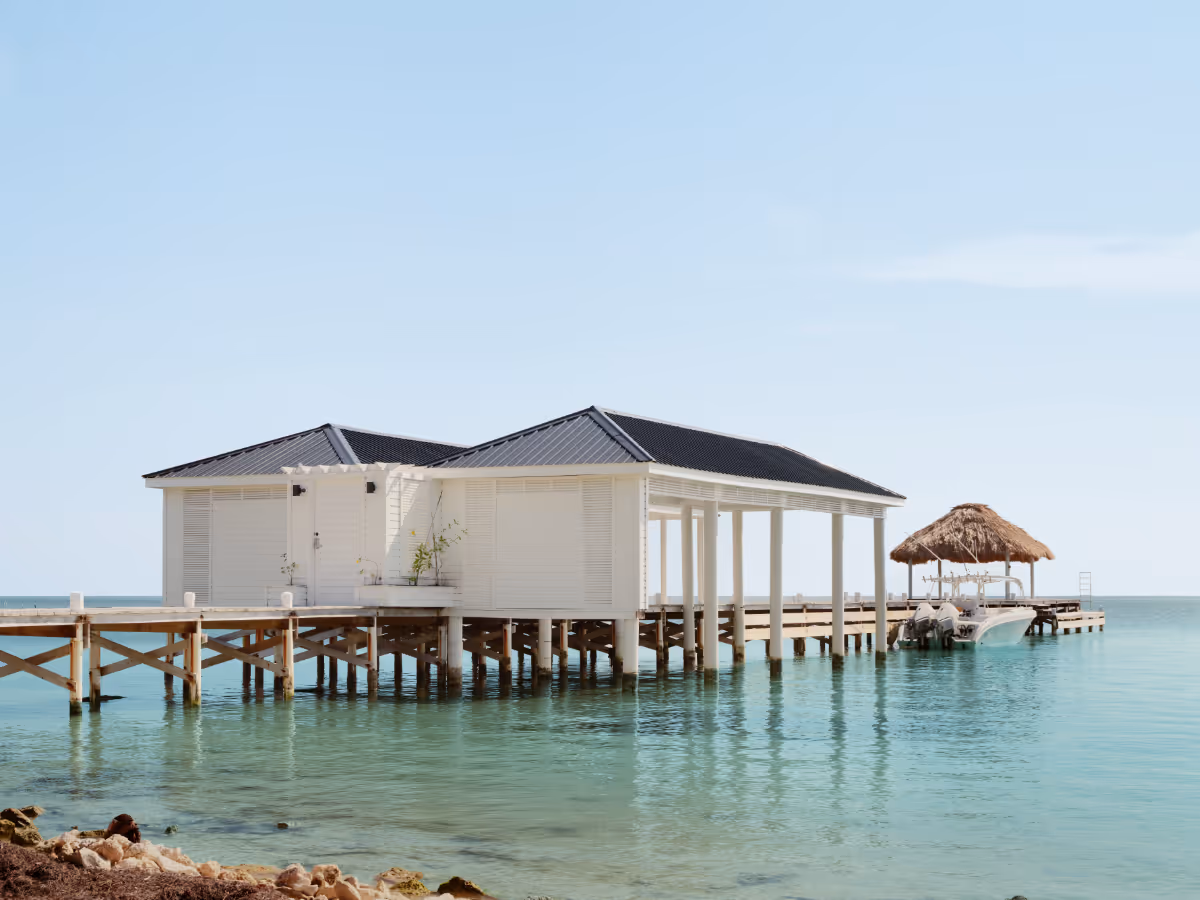 Boathouse at a tropical modern house in Belize by The Ranch Mine