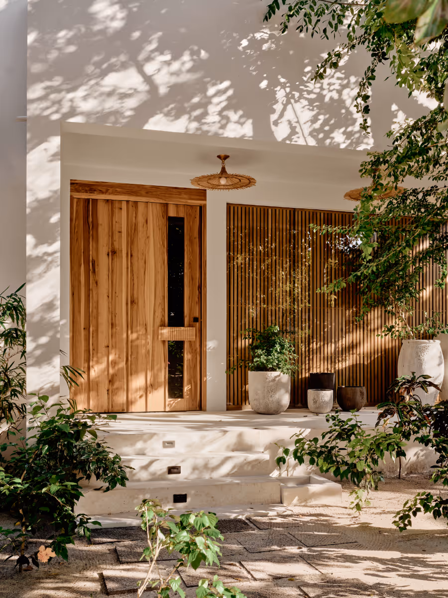 Front door at a tropical modern house in Belize by The Ranch Mine