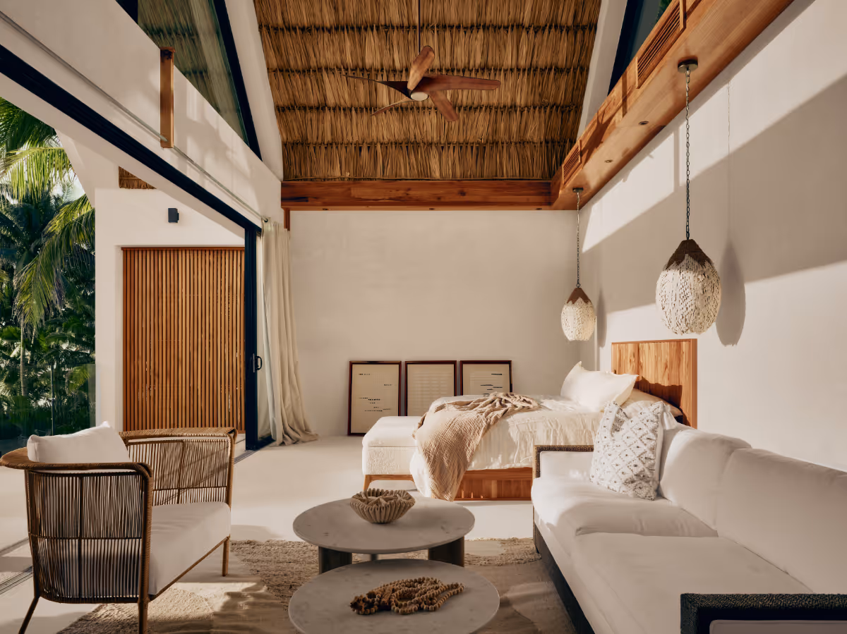 Primary bedroom at a tropical modern house in Belize by The Ranch Mine
