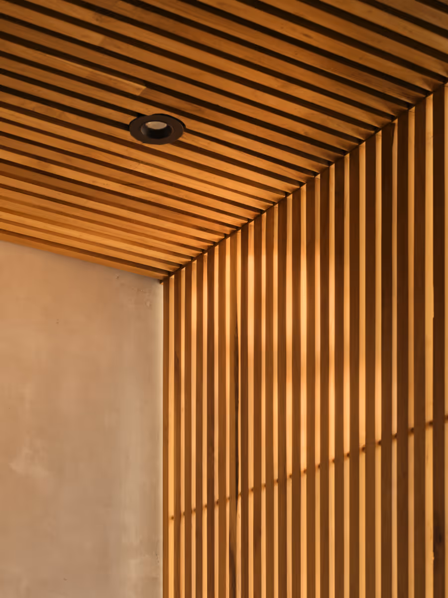 Custom slat detail at a tropical modern house in Belize by The Ranch Mine