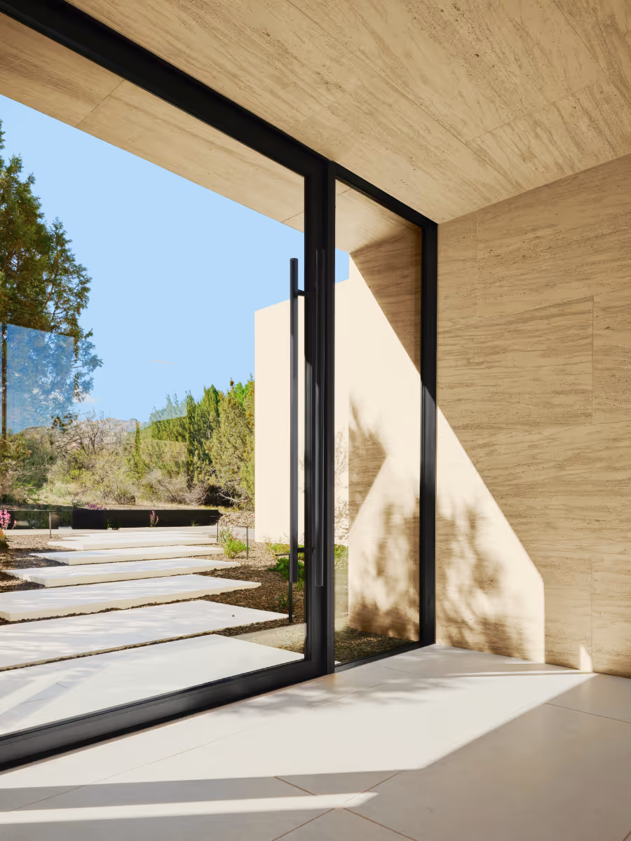 Limestone entry to a modern new build home in Sedona by The Ranch Mine