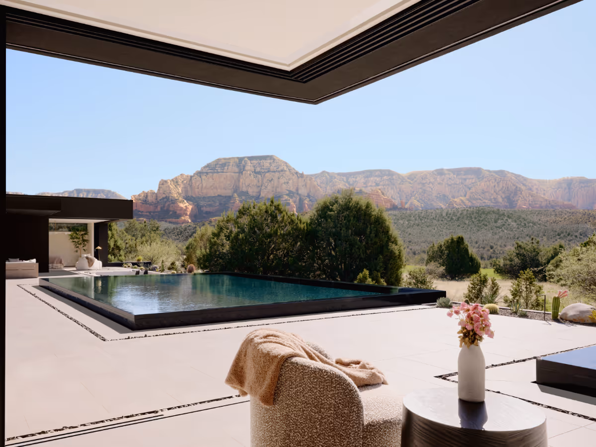 Corner pocketing glass doors open the office up to the courtyard in Seven Canyons in Sedona by The Ranch Mine