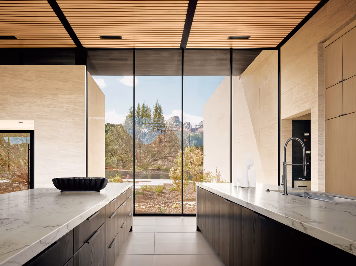 Kitchen with custom wood slat ceiling in new build home in Seven Canyons in Sedona by The Ranch Mine