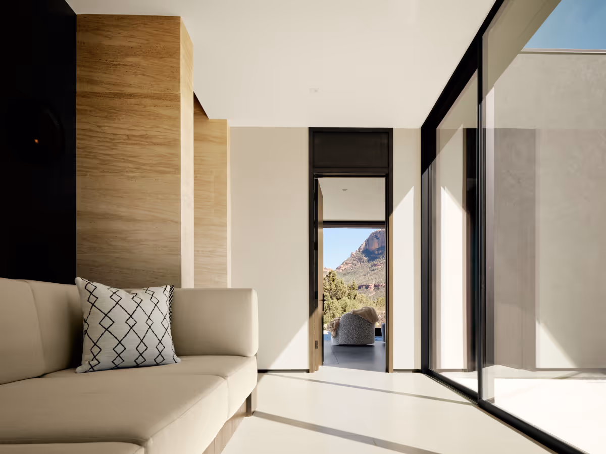 Sun lit cuddle couch in new build home in Sedona by The Ranch Mine