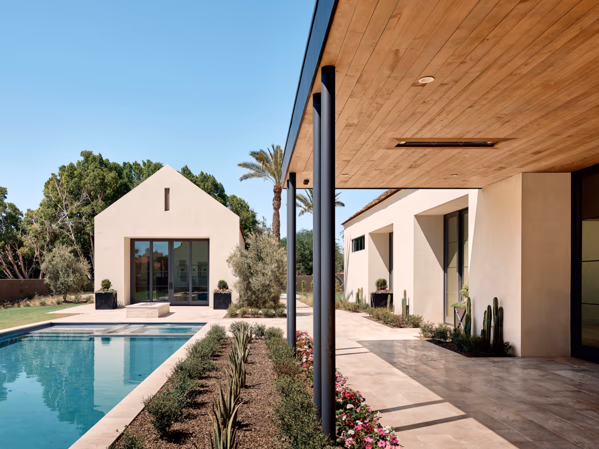 Pool edge and planting forming a refined court for gatherings and laps, by The Ranch Mine.