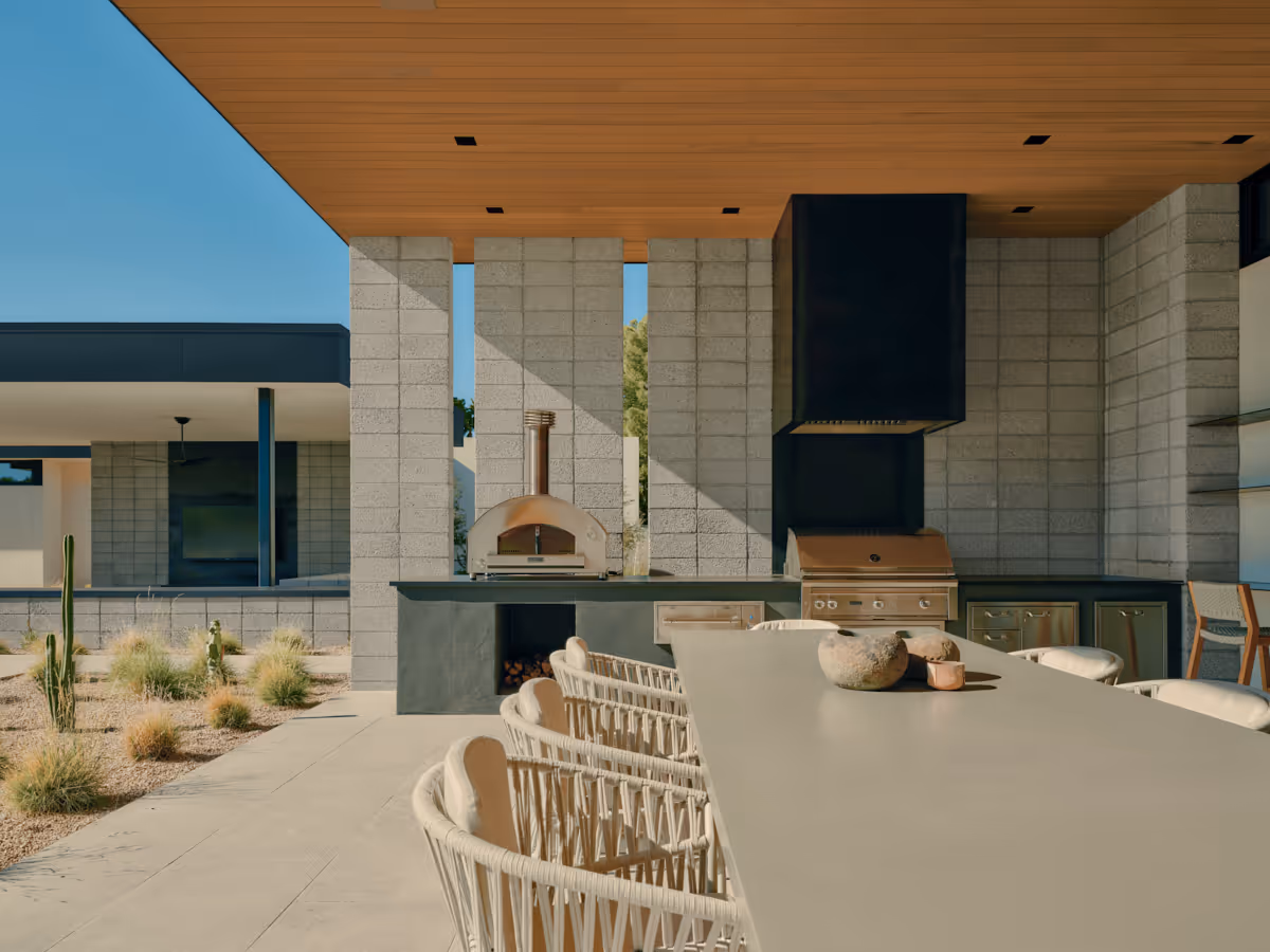 outdoor kitchen and dining  at Full Circle, a multigenerational new build compound in Paradise Valley, Arizona by The Ranch Mine