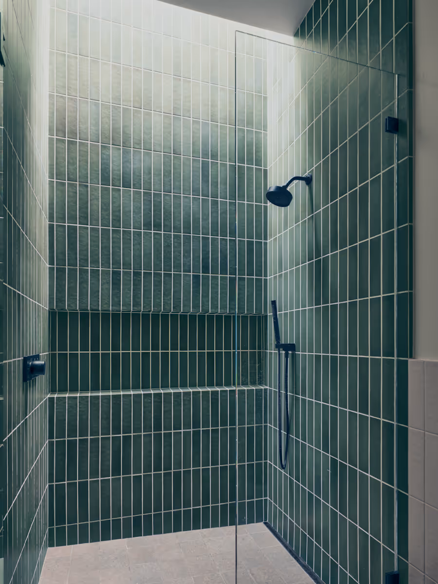 tile shower with skylight  at Full Circle, a multigenerational new build compound in Paradise Valley, Arizona by The Ranch Mine