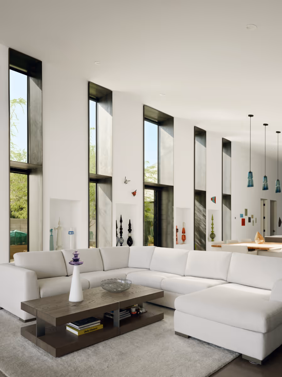 modern interior of a vaulted living area in a glass artist house