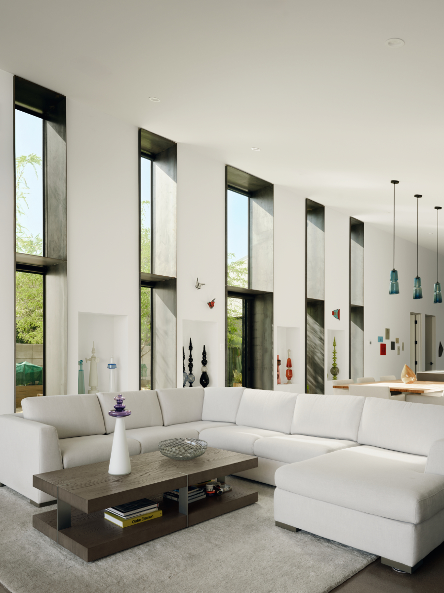 modern interior of a vaulted living area in a glass artist house
