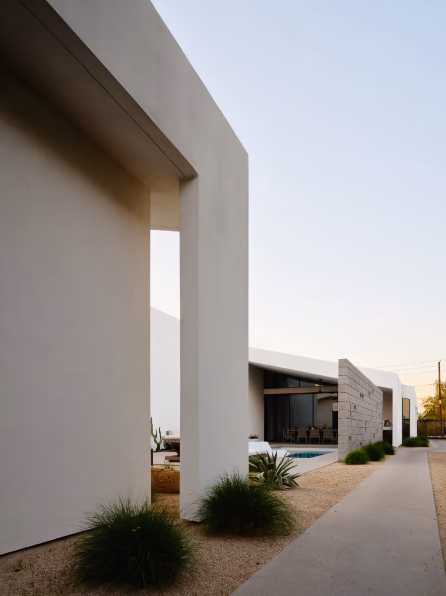 a modern home on a long narrow lot for an artist with a courtyard pool