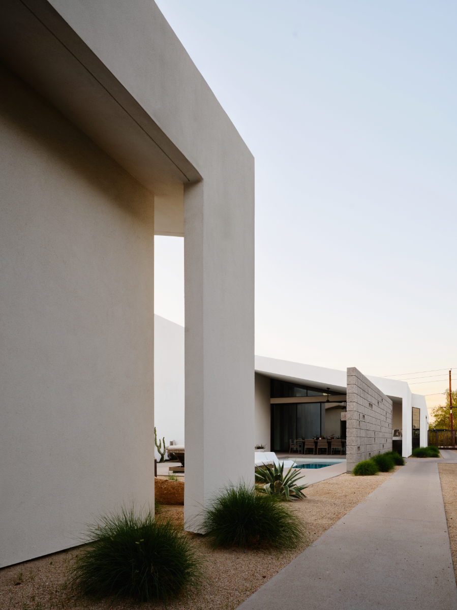 a modern home on a long narrow lot for an artist with a courtyard pool