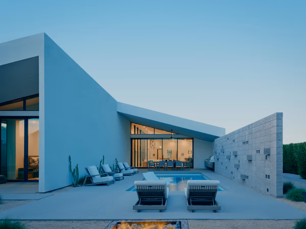 a modern offset gable house in Phoenix Arizona for an artist with concrete block and white stucco and a courtyard pool