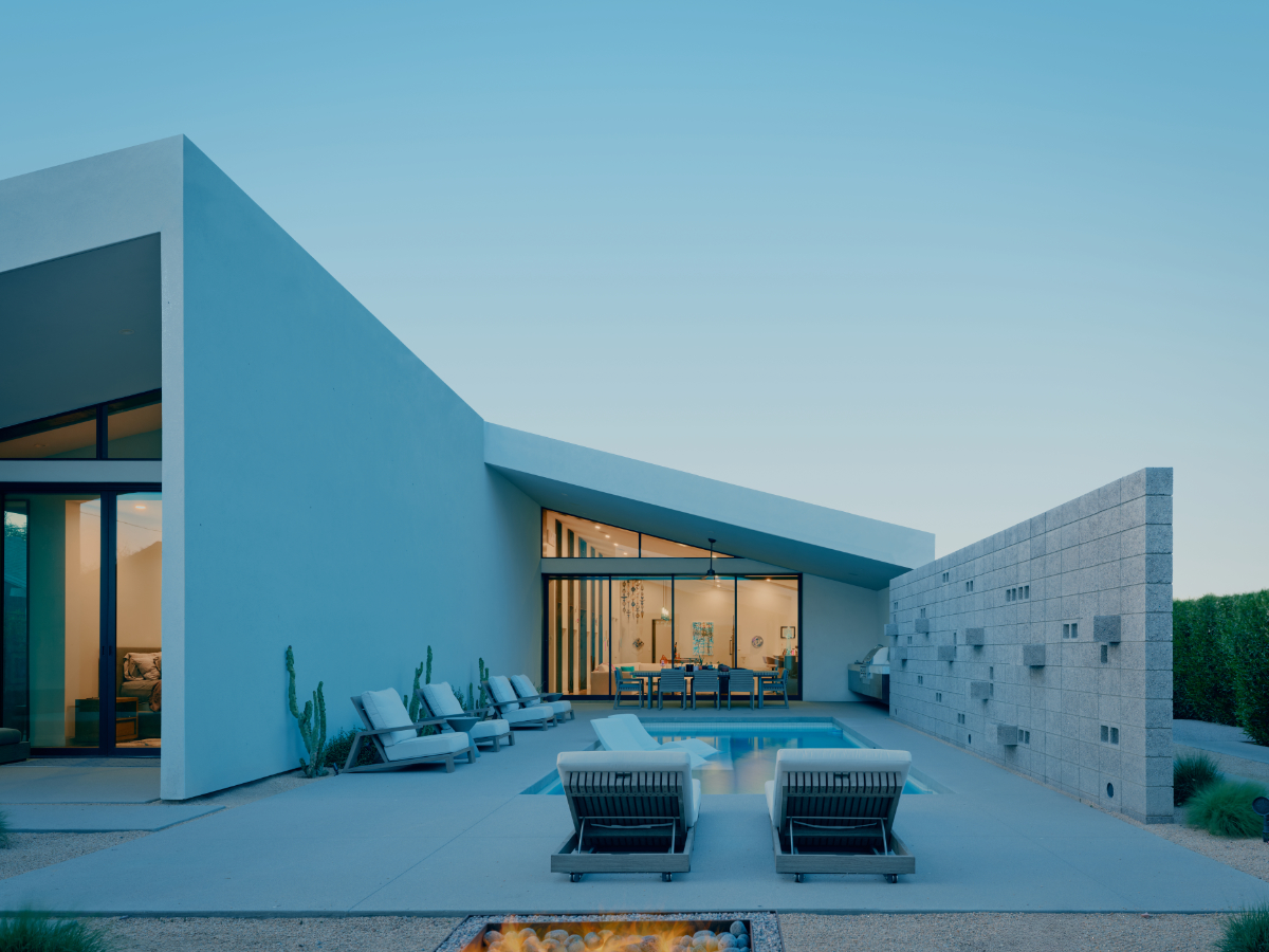 a modern offset gable house in Phoenix Arizona for an artist with concrete block and white stucco and a courtyard pool