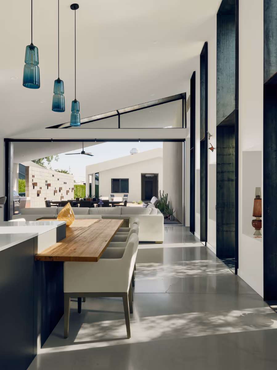 modern interior of a vaulted living area in a glass artist house