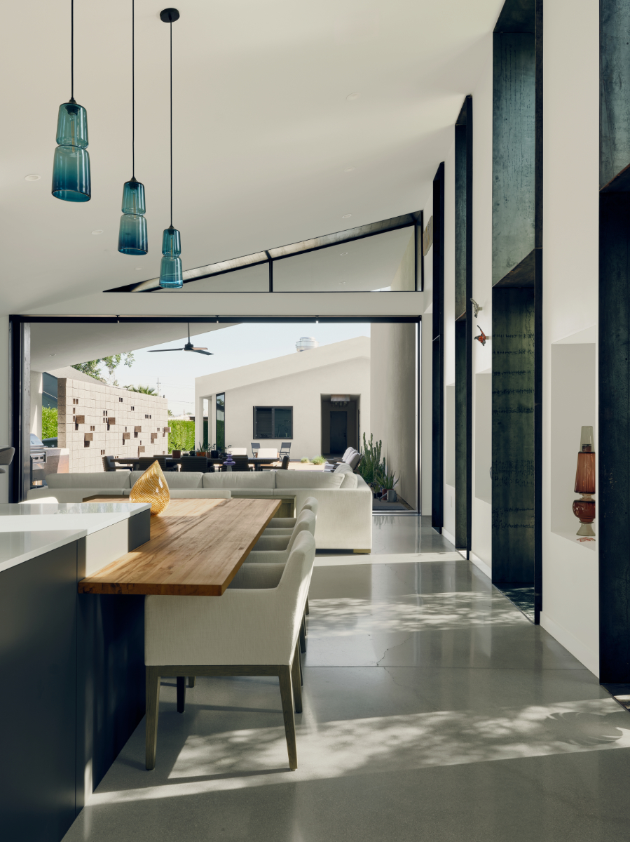 modern interior of a vaulted living area in a glass artist house