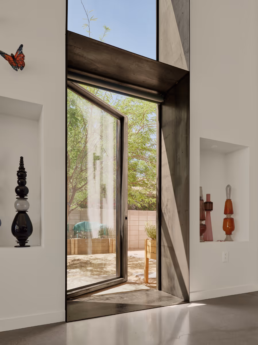 modern interior of a vaulted living area in a glass artist house