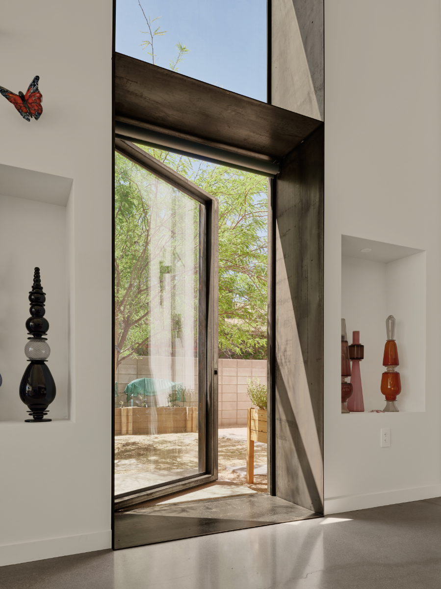 modern interior of a vaulted living area in a glass artist house