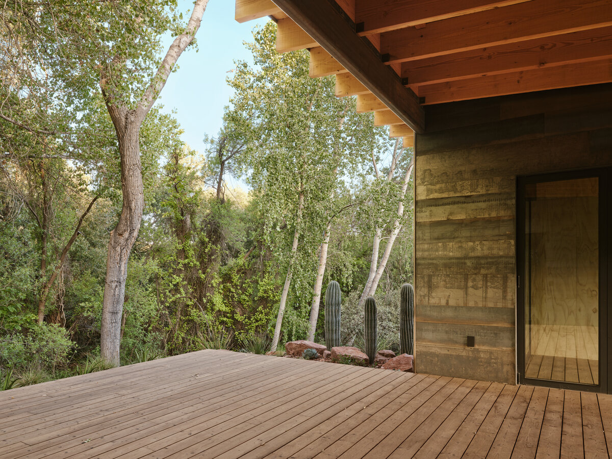 modern pavilion framing the woods by a creek in Sedona