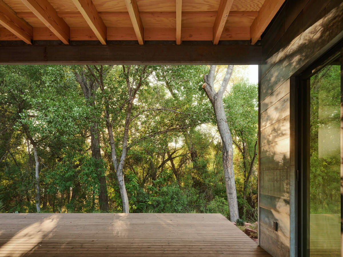 modern pavilion framing the woods by a creek in Sedona