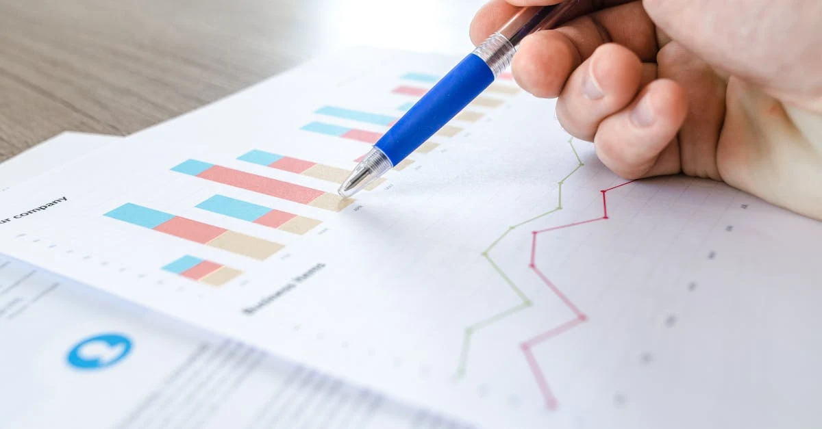 Hand holding blue pen pointing to declining line graph and colorful bar charts showing enterprise SEO mistakes data analysis.