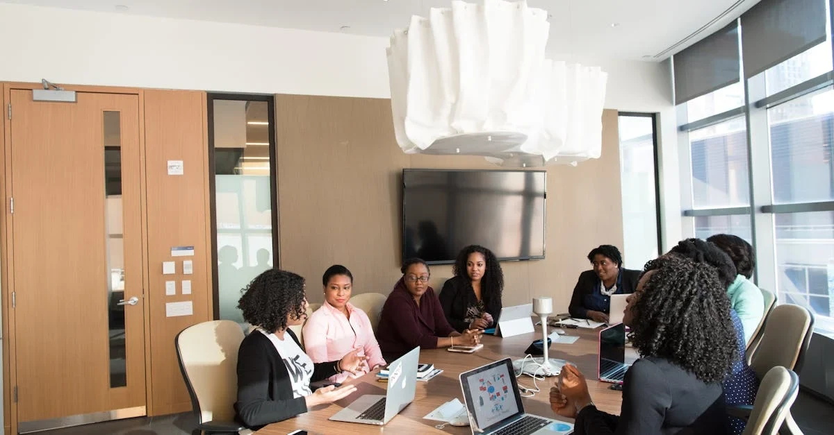 Business professionals discussing outsource enterprise SEO strategies around conference table in modern office.