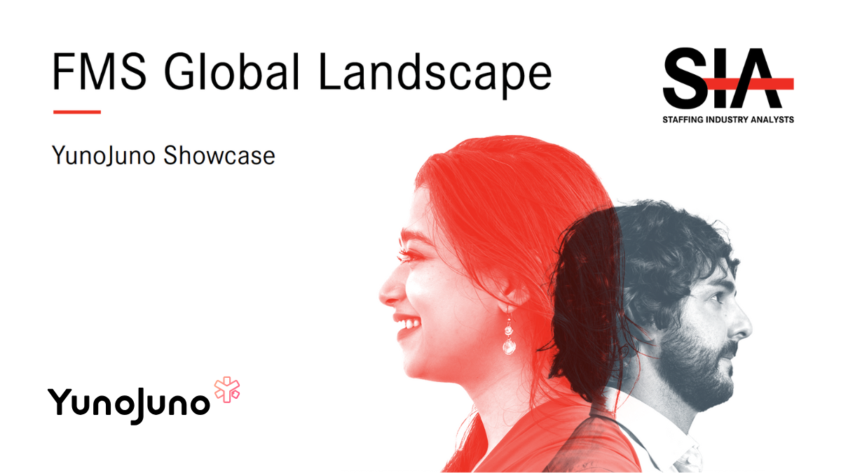 Guy wearing a suit and looking ahead smiling