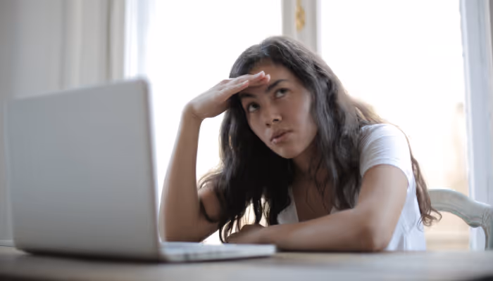frustrated woman on a computer