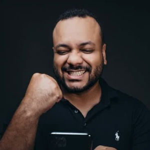 man pumping fist in excitement