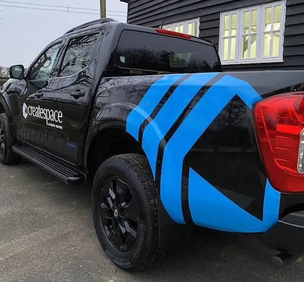 Custom cut graphics on Createspace's pick-up ute.