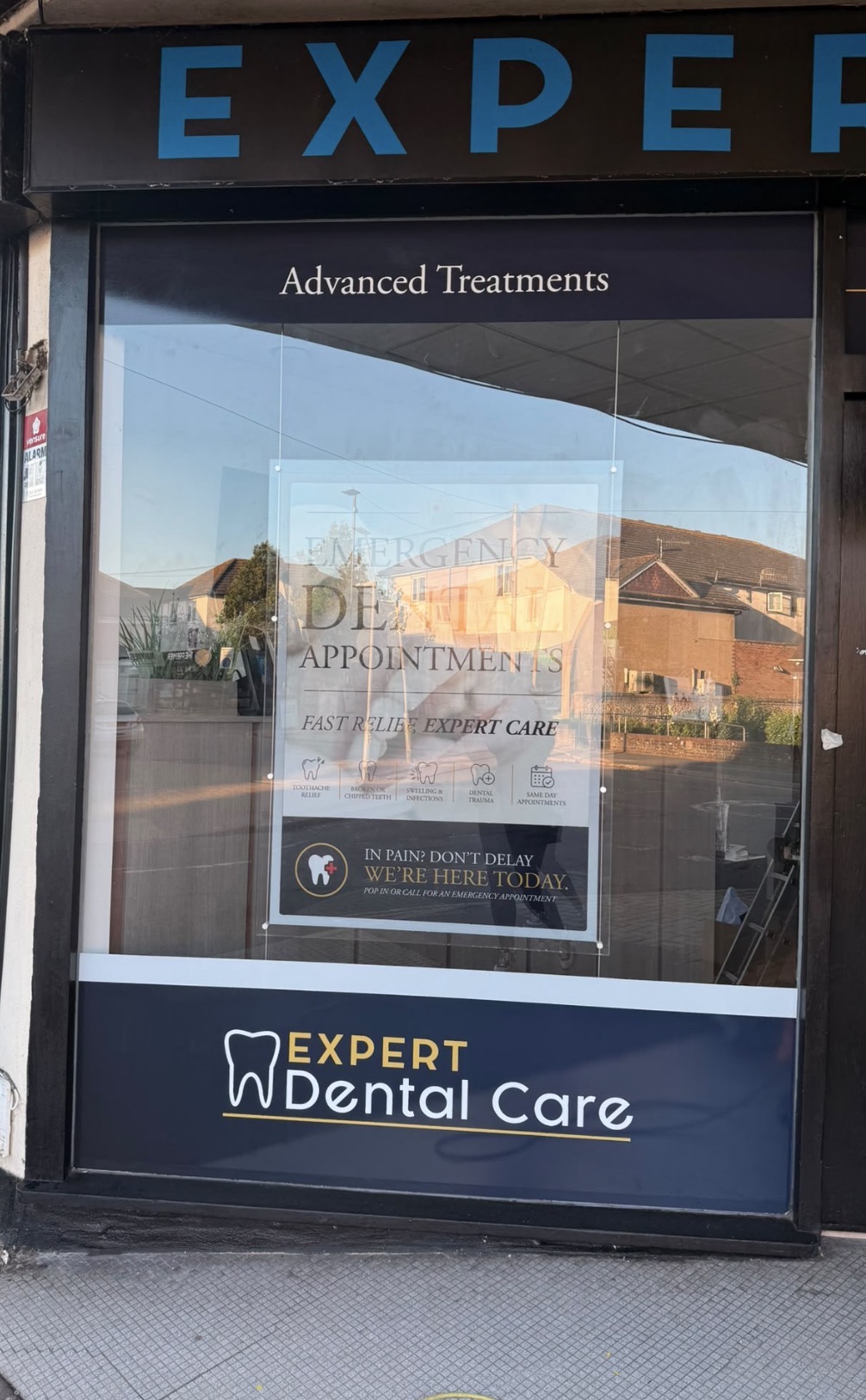 Advanced treatments window graphics at Expert Dental Care.