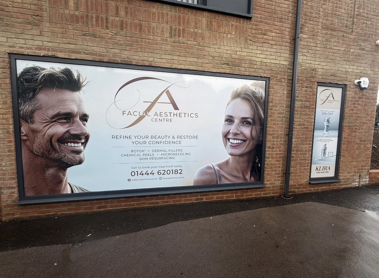 Framed exterior wall graphic for the Facial Aesthetics Centre.