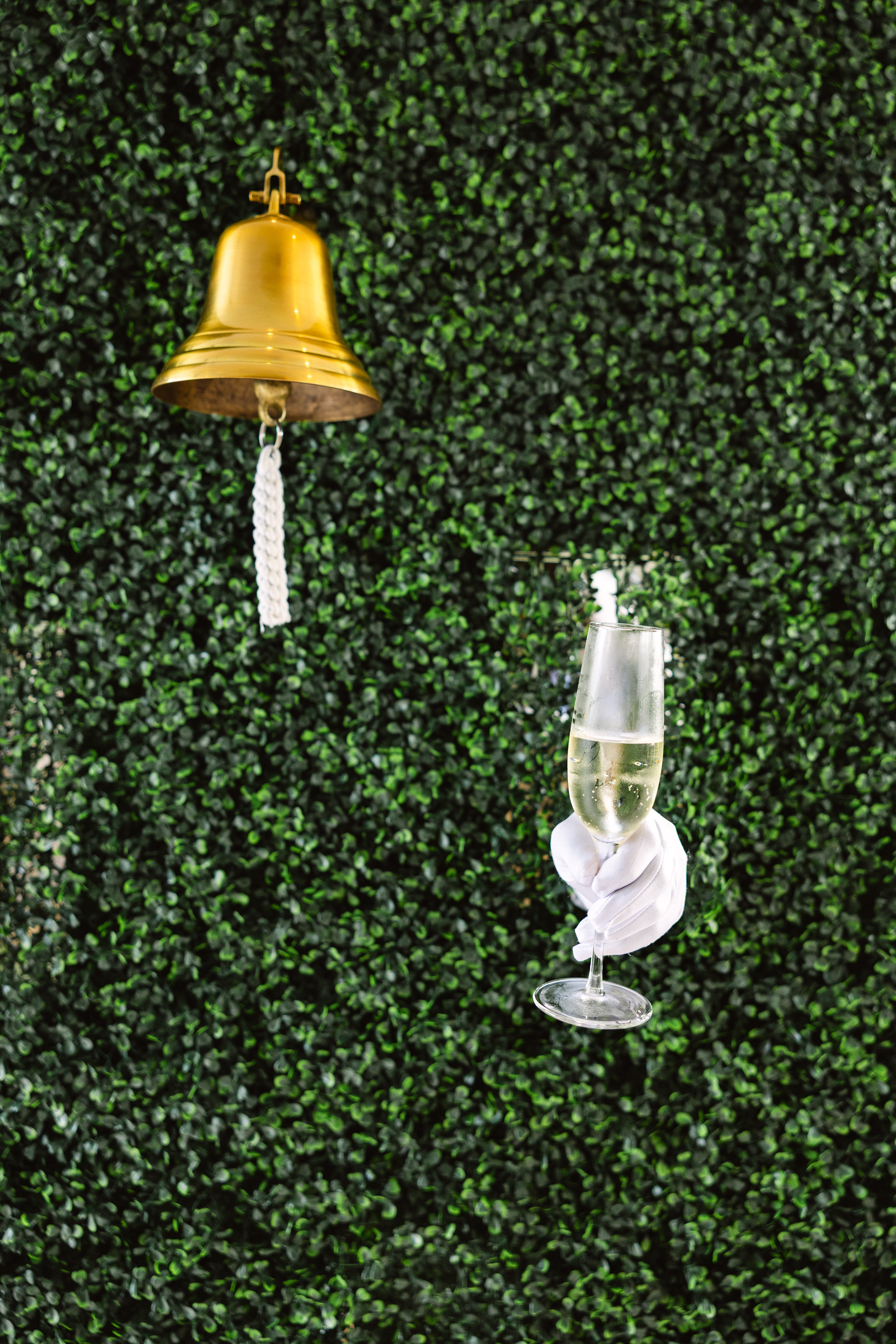 Champagne wall display welcoming guests to Allie and Tyler's wedding celebration.