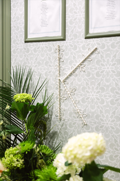 White floral arrangements and ceremony décor at a Turtle Creek Country Club wedding.